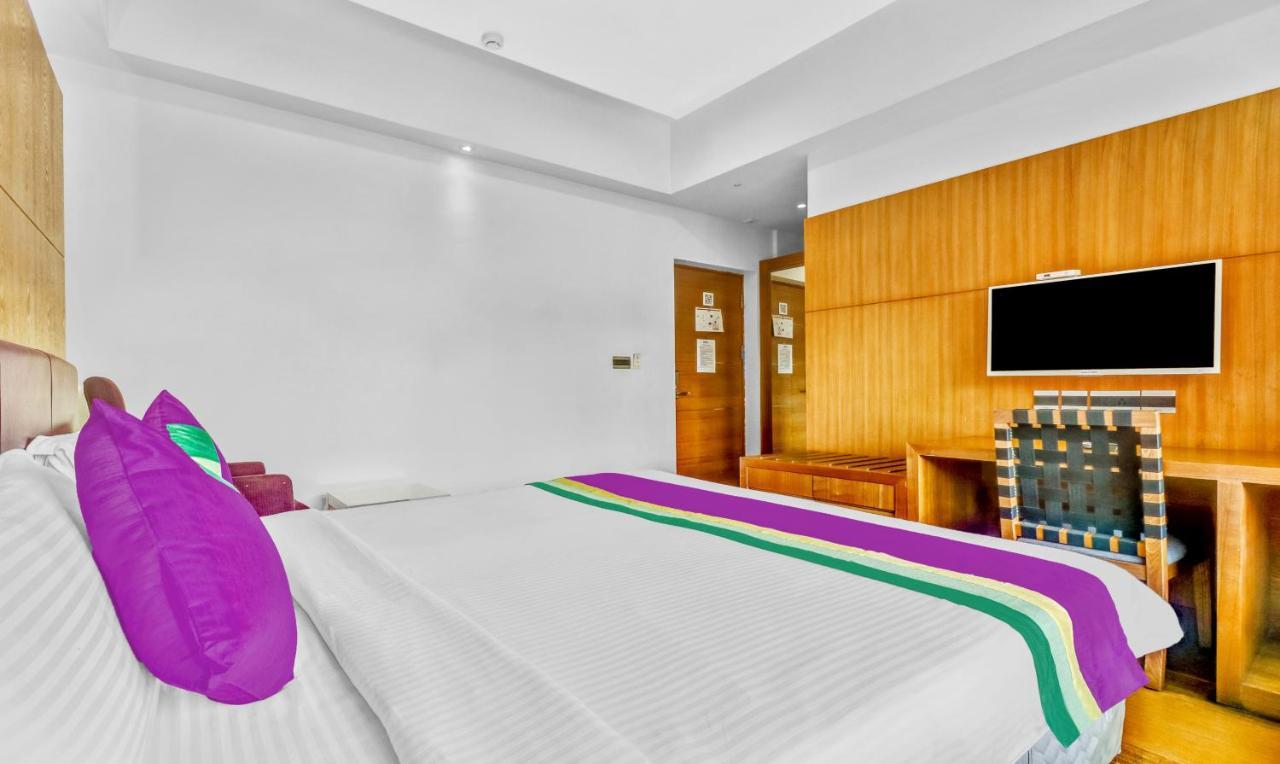 Medora Hotel Кожикоде Экстерьер фото
