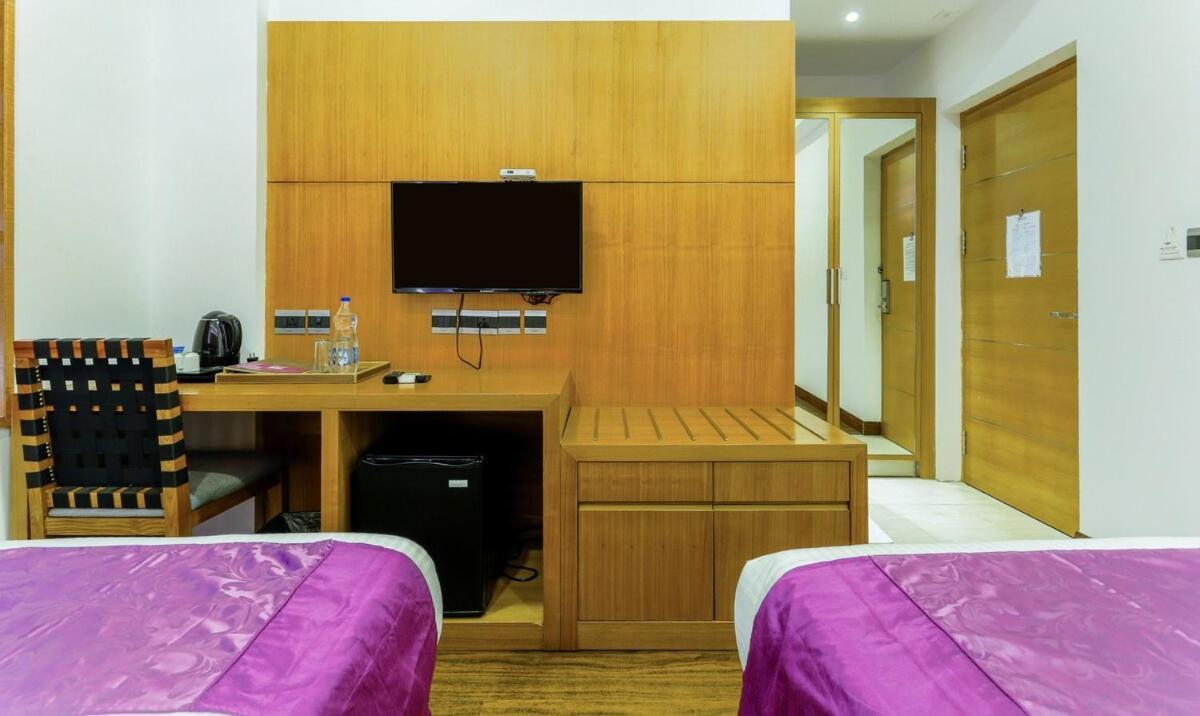 Medora Hotel Кожикоде Экстерьер фото